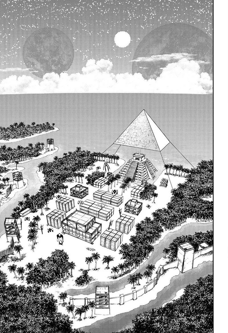 The pyramid is on the coast, facing the sea, with coconut trees on the sides and boxes on the ground.