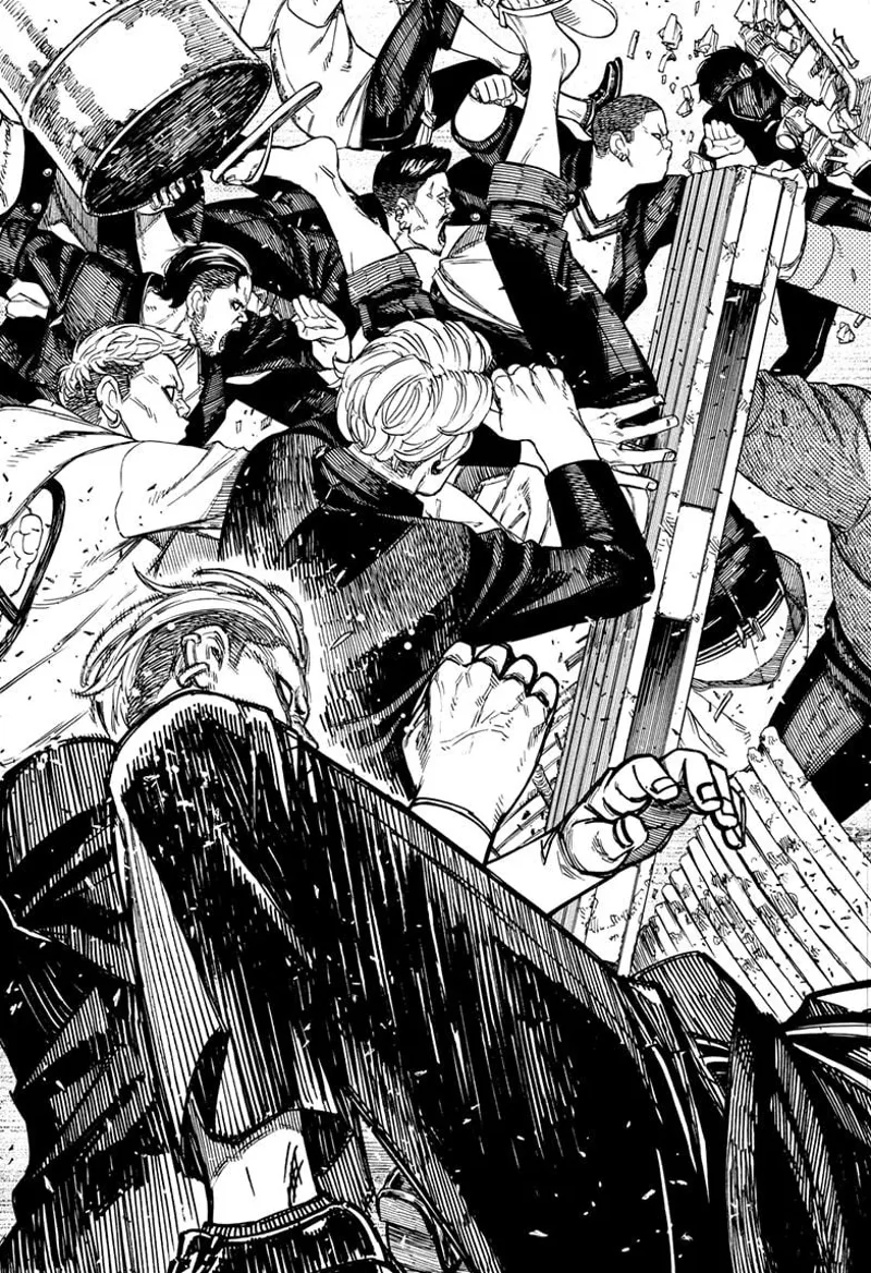The two gangs use pallets while kicking and punching one another.