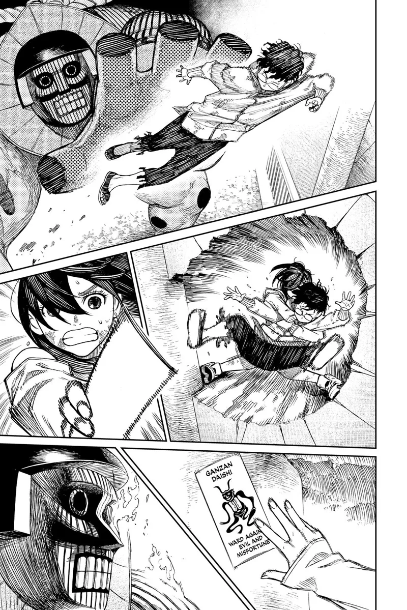 Ayase pulls Okarun towards her while the alien watches. She puts the seal on the Tori Gate, and the alien starts burning.