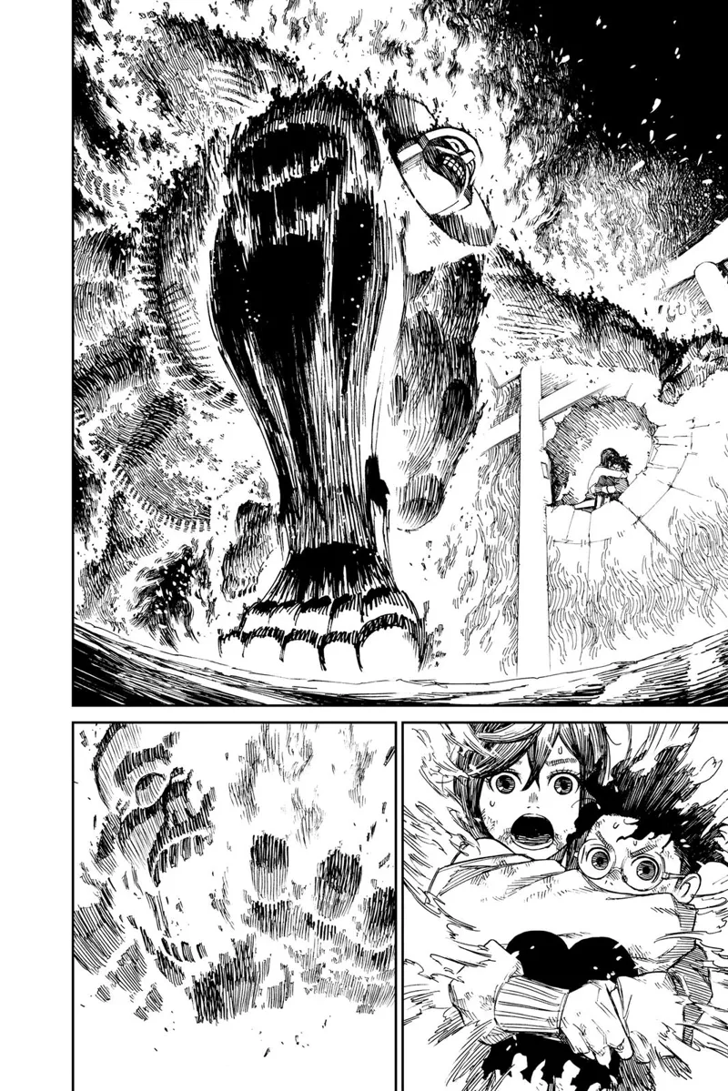 Ayase and Okarun hug each other and watch as the monster alien burns.