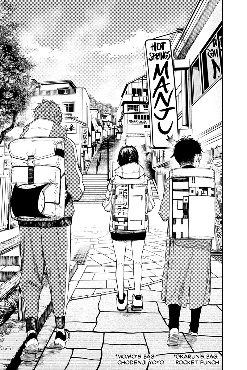 Okarun, Momo, and Jiji walk with their backpacks on an empty street near the store, which has the sign 'Hot Springs Manji'.